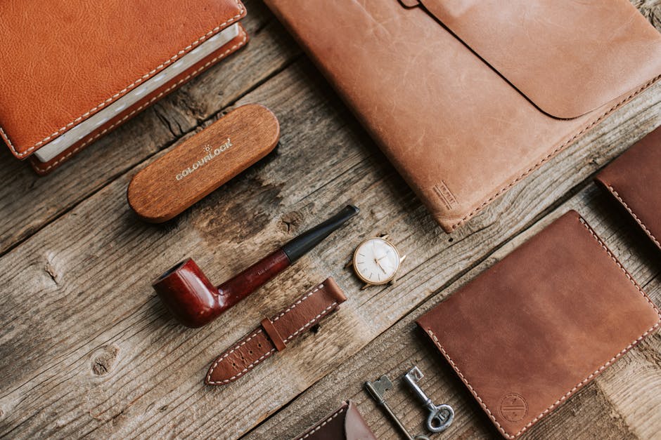 Brown leather wallet displayed on a wooden surface with minimalistic style.